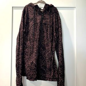 Lululemon black with pink floral design zip up size 8 - only worn once!
